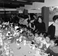 Camacho Quiros (second from right) visiting a school in Morelos, Mexico on 15 February 1963.