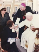 84 papa.png (144 KB) Papa (front left, age 84) kisses St. Pope John Paul II’s hand in St. Peter’s Square in Rome in Early 1998.