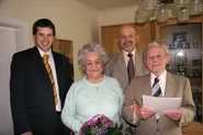 Alois Mayrhofer95.jpg (35 KB) Alois Mayrhofer (aged 95) with his wife Magdalena (aged 88), the mayor Franz Pichler-Holzer and the district captaincy member Florian Morgenbesser.
