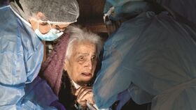 Maria da Encarnacao at 111, being vaccinated against Covid-19