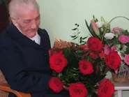 Jadwiga Mlynek (aged 105) with her roses.
