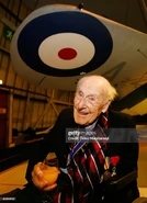 Henry Allingham (aged 111) sitting under an Air Force plane on 18 March 2008