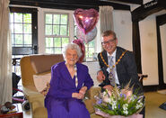 Caterham on her 109th birthday in 2018, with the Mayor of Surrey Heath, Councillor Dan Adams