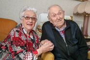 Marcel Meys in October 2021, aged 112, with his daughter.