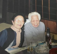Yasue Okai (aged 97, on the left) with her younger sister