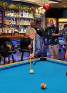 Piano (age 104) playing pool one day before her 105th birthday on April 9, 2023.