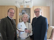 Alois Mayrhofer101.png (48 KB) Alois Mayrhofer on his 101st birthday (2014) with the mayor Josef Freiler and the district captain Andreas Strobl.