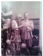 Nouel Joubert (dressed up as a gypsy) reading Juan Vicente Gomez's hand in a carnival in Maracay