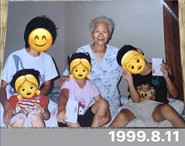 Tanaka with her family on 11 August 1999 at 96