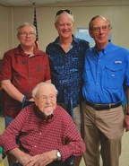 Smith (aged 110) with his sons.