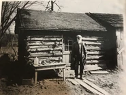 Hodge in an undated photo, likely in front of his house/lodge/cabin.