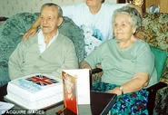 Tarrant on his 100th birthday with his wife Phyllis in 2003