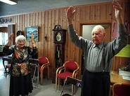 Hovatn (right) at the age of 106 exercising with his 80-year-old daughter Gunhild Marie (left) in 1999.