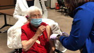 Hawkins receiving her second dose of the Pfizer–BioNTech COVID-19 vaccine on 23 January 2021 at the age of 104