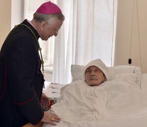 Maria Roszak with Archbishop Marek Jędraszewski on her 110th birthday in 2018