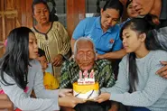 On his claimed 146th birthday in 2016, with his family