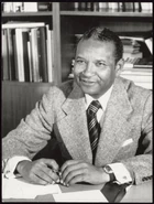 M'Bow (age 53) sitting at his desk in Paris, France in November 1974.