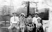 Lindefjeld (center right) with her husband Anders (right), eldest son Otto (far right), her sister Mari (center left) and brother-in-law Torkel Haddeland (far left) in Amsterdam Park, New York in 1928