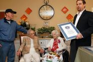 Edna Parker (seated right) at 114 and Bertha Fry at 113 (seated left) being honored by Guinness World Records.