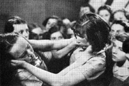 A fight breaks out at school between Midge Carne (Glynis Johns, left (aged 14) and Lydia Holly (Joan Ellum) in the 1938 film South Riding, produced by Alexander Korda and directed by Victor Saville. In Mid 1937.