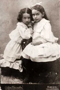 Dollinger (left) as a child with her older sister, Helene.
