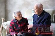 Wang Sunshi in May 2021, at the claimed age of 111, with her 85-year-old son Wang Fuzhen.