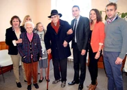 Bresson (white hair, second from left) on her 100th birthday in 2013