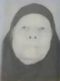 Fatema Amr Eissa Qadib as an older woman (on her ID card).