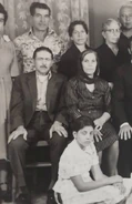 With her husband Michalis, and her siblings (undated photo)