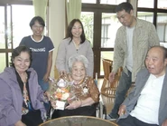 On her 103rd birthday in 2013, with her family