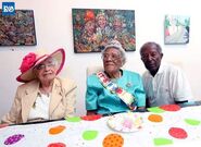 Triple centenarians: Myrtle Edness (centre) celebrates her 103th birthday with friends Mary Williams (aged 101) and Lefroy Brownlow Place (aged 100) in July 2017