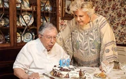 Celebrating his 103th birthday, with his wife, Eni in 2021.