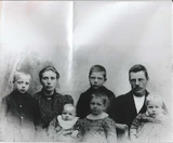 Ingemund Peterson pictured with his family as a young boy (on the far left).