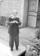 Fu Xinde standing at the age of 108 (claimed 109) in May 2010.