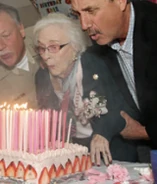 Edie110 2.png (75 KB) Ceccarelli blowing out the candles on her 110th birthday cake