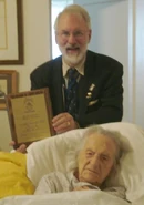 Dr. Stephen Coles presents Leila Denmark (aged 112) with an SRF Honorary Plaque in September 2010.
