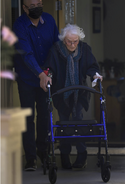 114 Edie Ceccarelli.png (1 MB) Ceccarelli using a walker on her 114th birthday in 2022