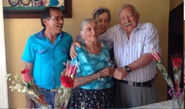 Rojas (aged 106) celebrating Mother’s Day with her son, her daughter-in-law, and her grandson in 2014