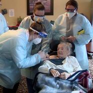 Plummer receiving the COVID-19 vaccine at her care home on 30 December 2020