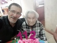 Casilda Benegas112.jpg (87 KB) Benegas on her 112th birthday with her grandson Tomas Antonio Blanco in 2019.