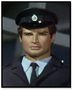 1st Prison Guard (Keith Alexander)