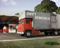 The Swift Removals truck parked outside