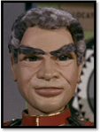 Commander Samuel "Sam" Shore (Ray Barrett)