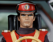 Captain Scarlet at the wheel