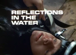 Title card (reflection in the water)