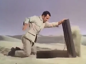 Max opens the entrance to the underground missile base.