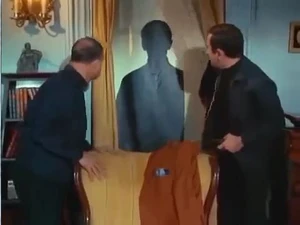 The old Maxwell Smart-silhouette-on-the-window-shade trick.