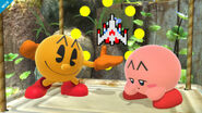 Kirby's PAC-MAN design and PAC-MAN holding a ship.