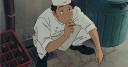 Der Chefkoch hält die Zigarette wie ein Gangstar.