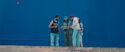Background actors filming against blue screen. (Credit: Sony Pictures Imageworks)